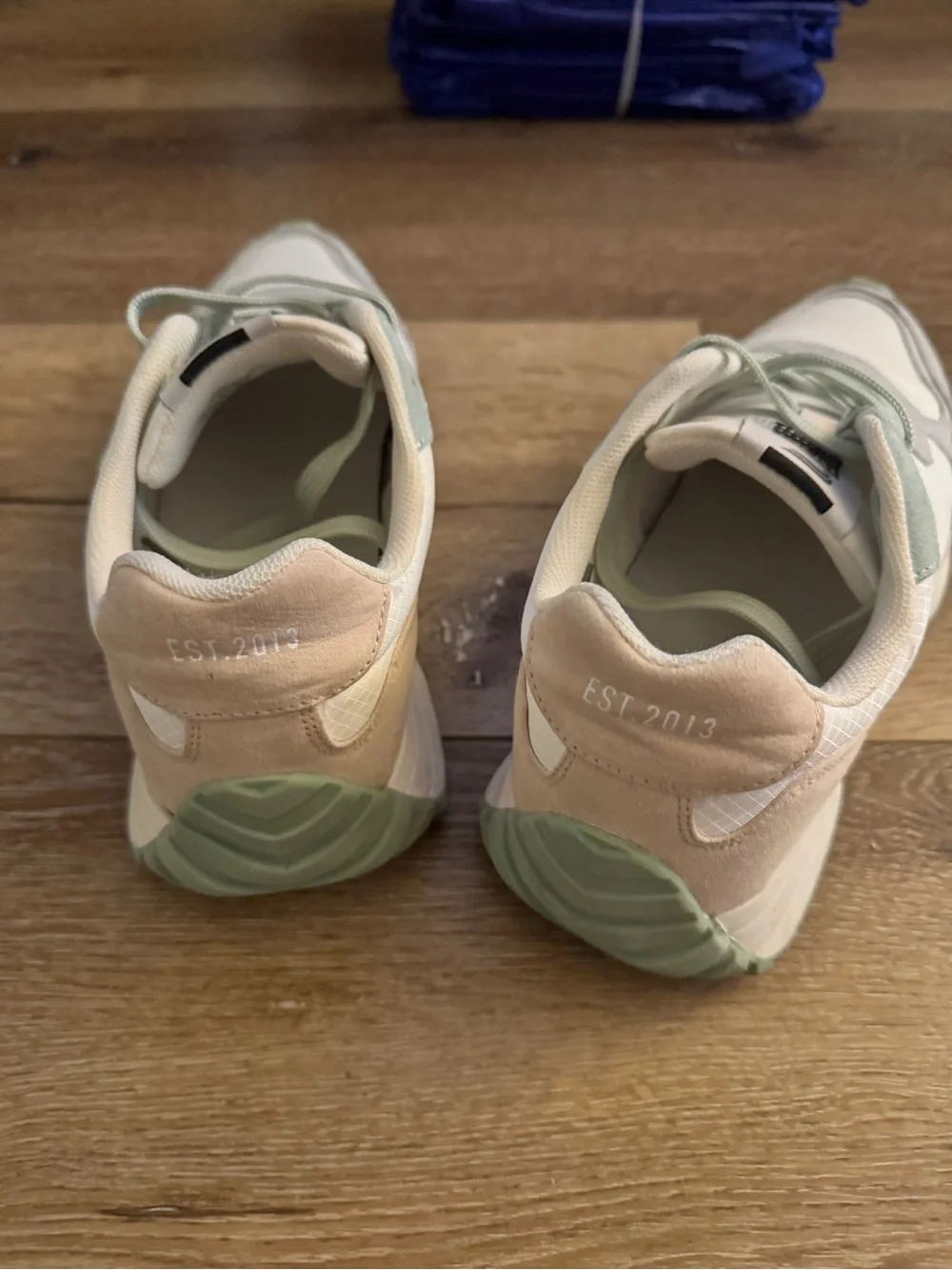 Fabletics White Sneakers with Light Gray and Mint Accents